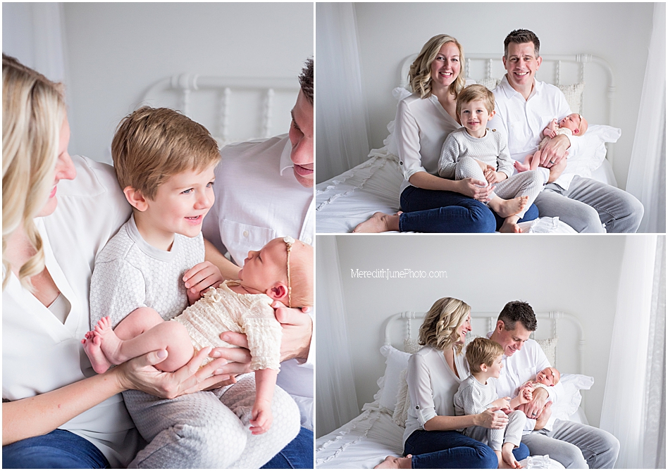 Simple studio session with newborn baby girl and family 