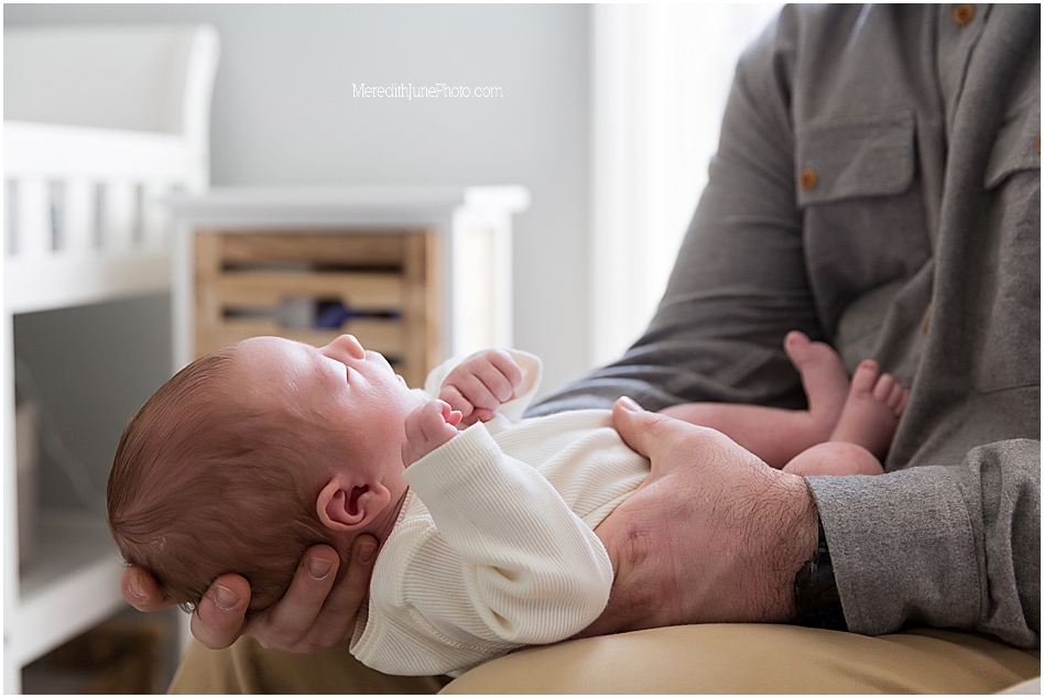 Newborn baby Rylan with dad in lifestyle session
