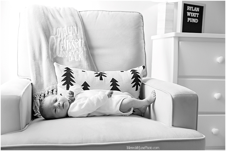 Black and white lifestyle photos of newborn 